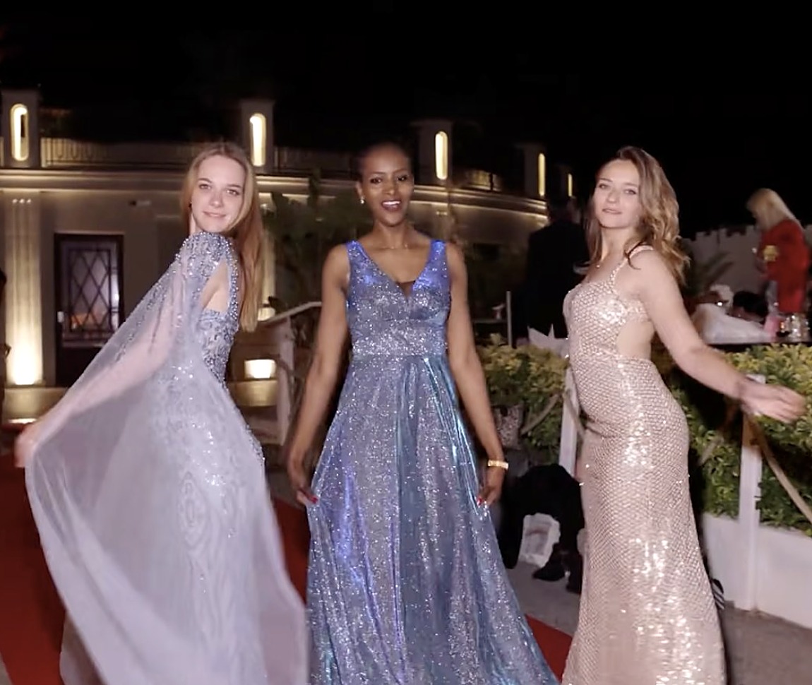Guests in elegant gowns on the red carpet — a night in Cannes